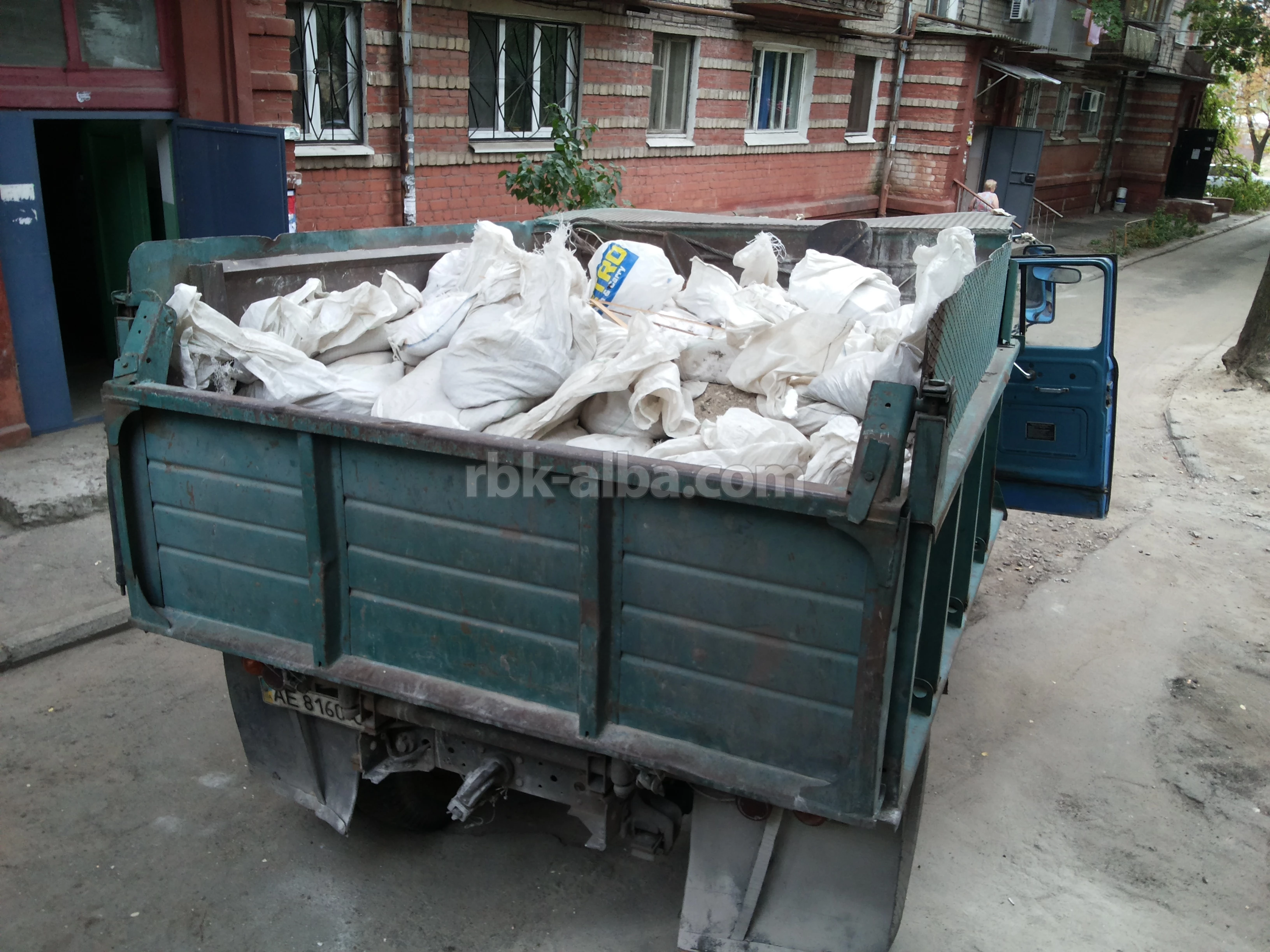 Garbage removal by dump trucks